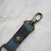 A luxury leather keyring featuring a custom Ogham text, The Celtic Tree Alphabet Key Fob from HÔRD.