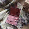 The Compact Mountain Purse, a personalised leather purse with the card holder and coin section. 
