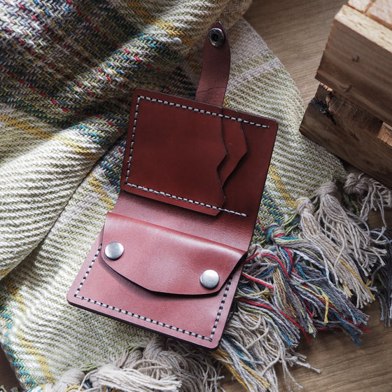 The Compact Mountain Purse, a personalised leather purse with the card holder and coin section. 