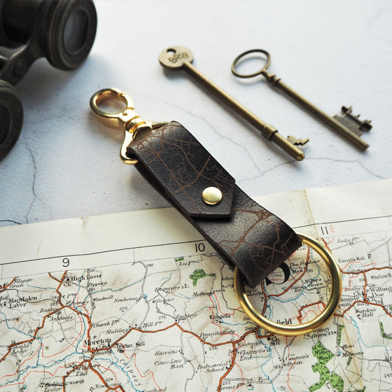 The custom road map key fob with brass swivel clip and O-ring.