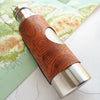 Closer look at the engraving of the custom location on the personalised water bottle from Hôrd.