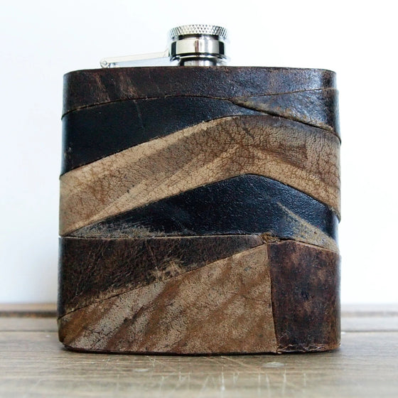 THe leather whiskey flask is crafted from leather remnants.
