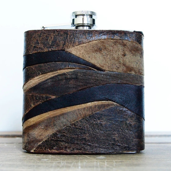 This leather hunting flask was originally designed for a collaboratioin between Etsy and the National History Museum.