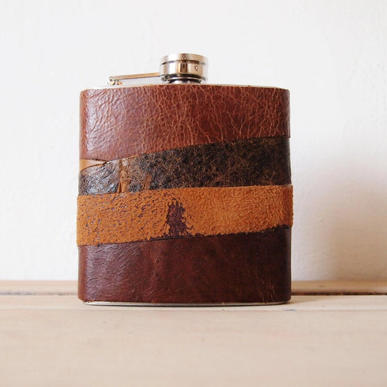 The Distressed Leather Flask, a rum flask by Hord.