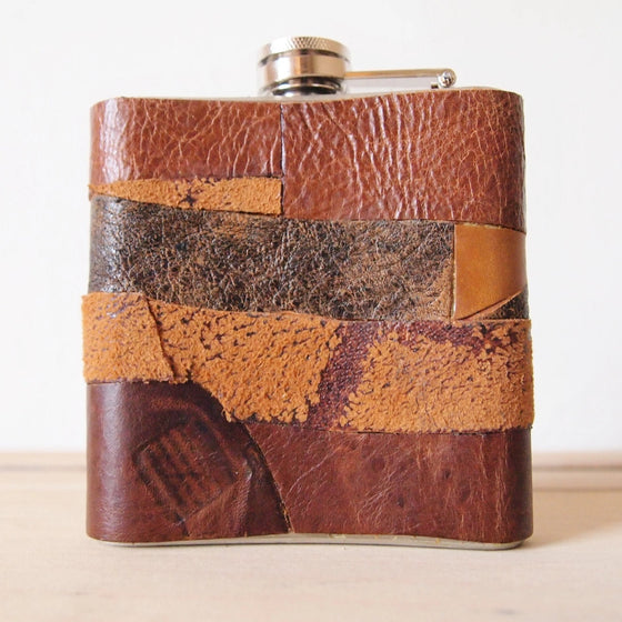 This rum flask is handcrafted from leather remnants.