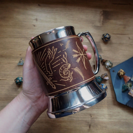 The Dungeoneers Tavern Mug in Chestnut is made from luxurious leather and wrapped around a steel tankard.