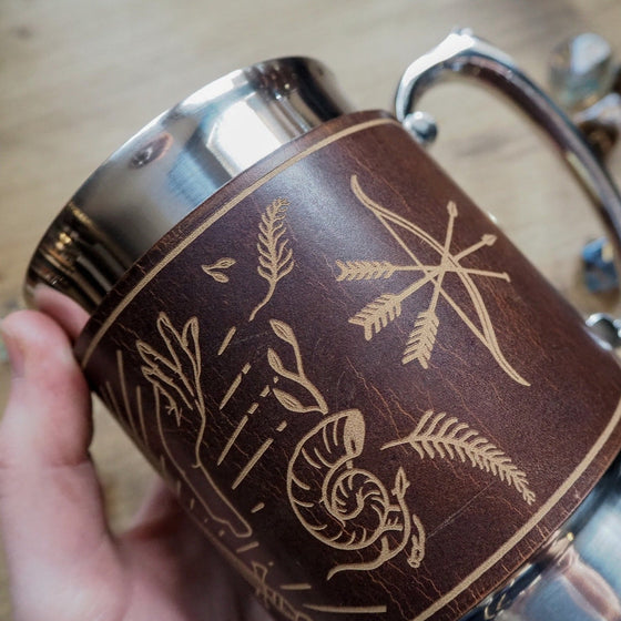 Bow and arrows engraved onto the tankard.