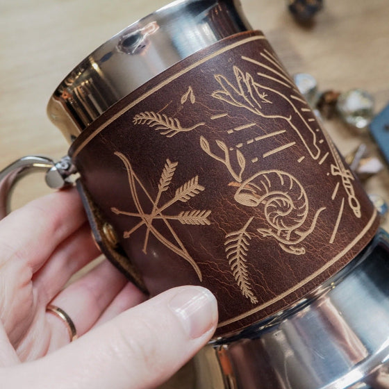 The Dungeoneers Tavern Mug in Chestnut is engraved with our Dungeoneer's design.