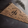 The family pennant, a leather home decor from Hord is engraved with the name of the family and is the perfect gift for a new family.