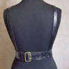 Posterior view of the leather chest harness by Hord.