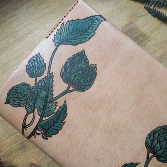 Detailed Hop Vine engraving on the Hop Vine Leather Journal Cover by HÔRD., the perfect beer log book cover.