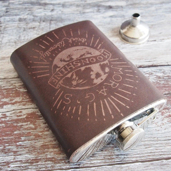 This Moonshine Flask is made from luxurious leather and clad onto a stainless steel flask. 