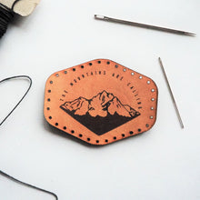  The Mountains Are Calling, Leather mountain Patch by HORD - This leather patch is hand dyed and engraved with wonderful mountains and the quote 'The Mountains Are Calling'. Perfect stocking fillers or gifts for lovers of the outdoors, mountaineering and hiking.