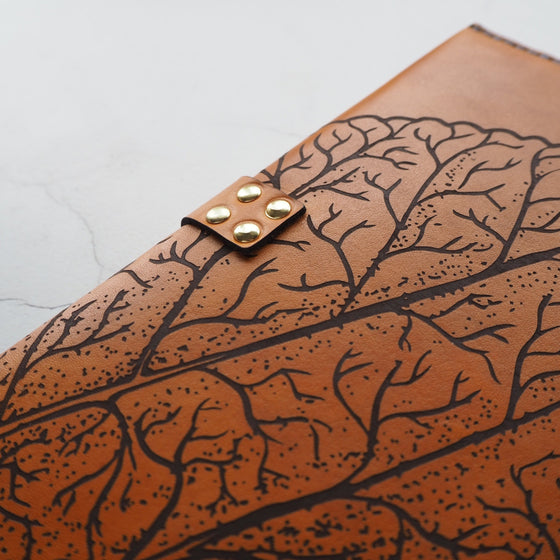 Close-up on the engraving on the Mulberry Leaf Journal Cover by HÔRD.