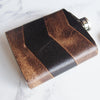 This personalized hip flask is made from luxurious leather and clad onto a stainless steel flask.