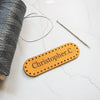 This personalised leather patch from Hord comes with pre-cut stitch holes for ease of stitching