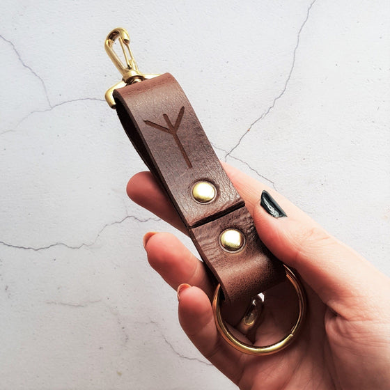 The Runic Leather Key Fob, a custom leather key ring from HÔRD.