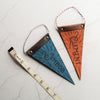 The Small Nursery Pennant with custom name written, a leather decor by Hord.