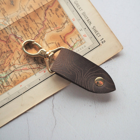 The Snowdon Leather Key Fob, a camping keyring from HÔRD.