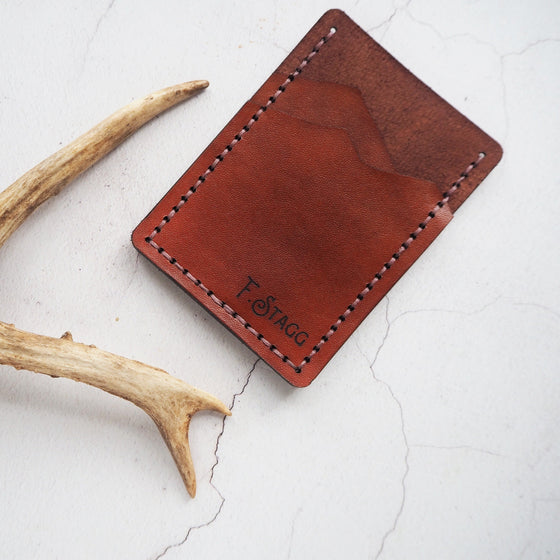The Stag Card Holder, a personalised credit card holder with a custom name engraved.