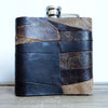 This leather whiskey flask is made from leather remnants.