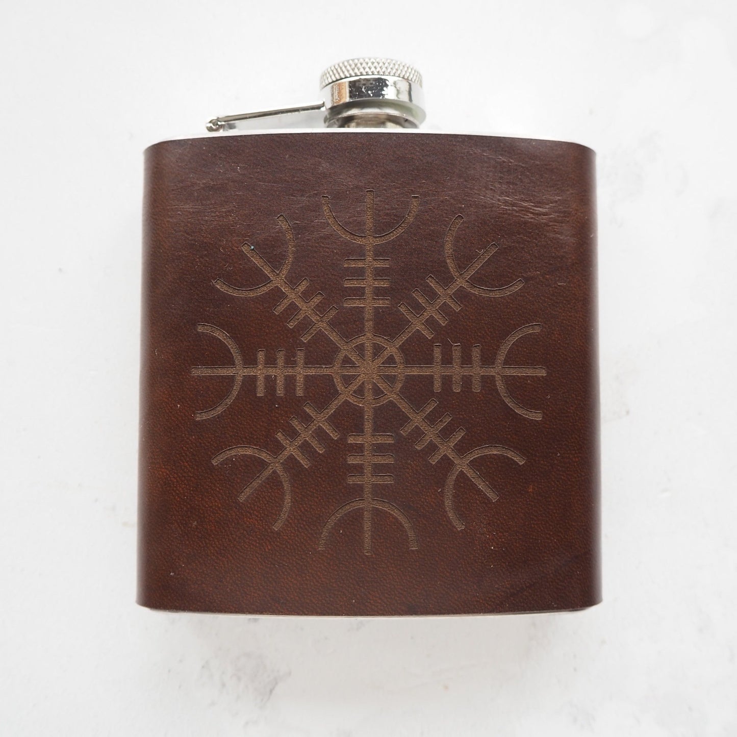 This viking flask is engraved with the aegishjalmur symbol.