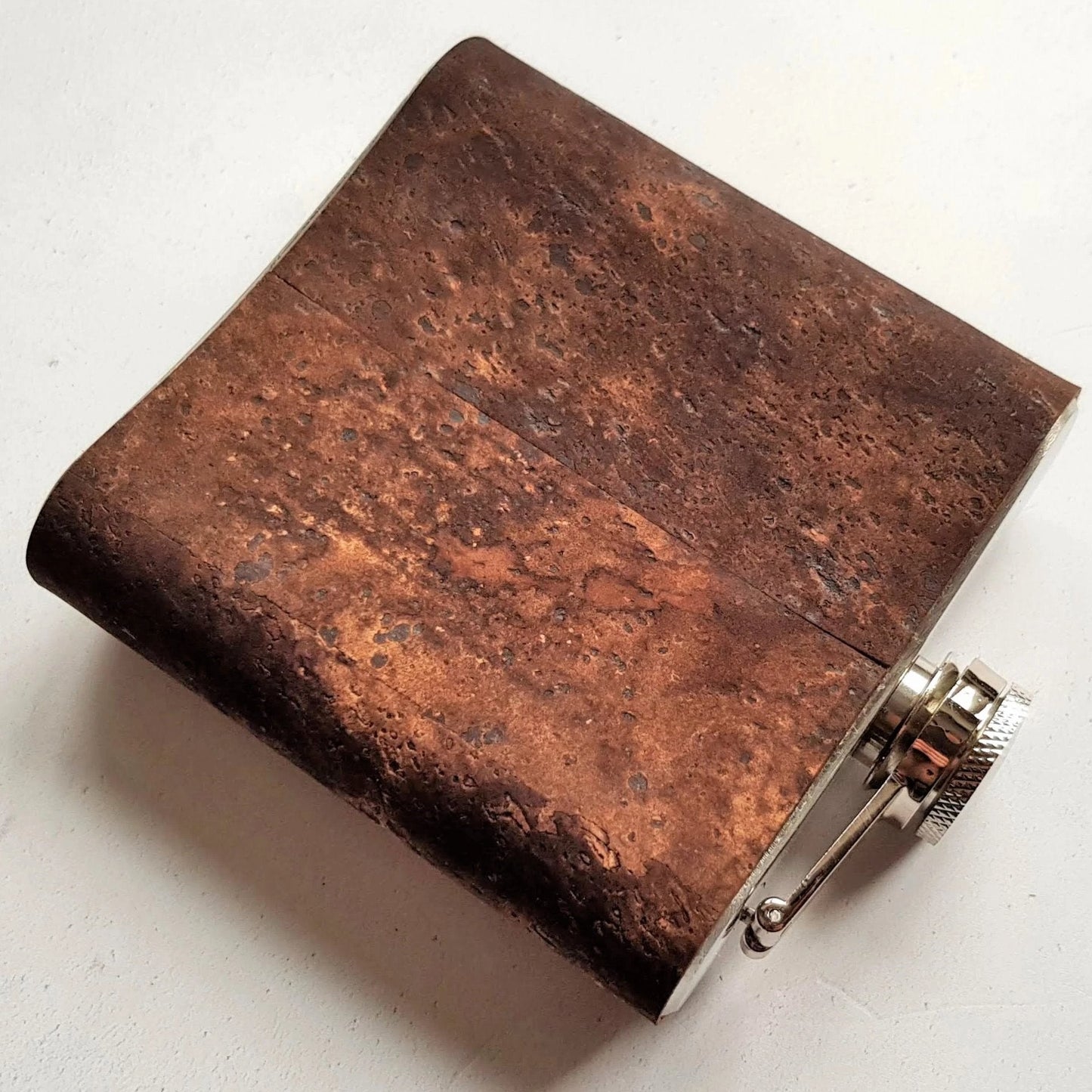 Posterior view of the groom hip flask by Hord.