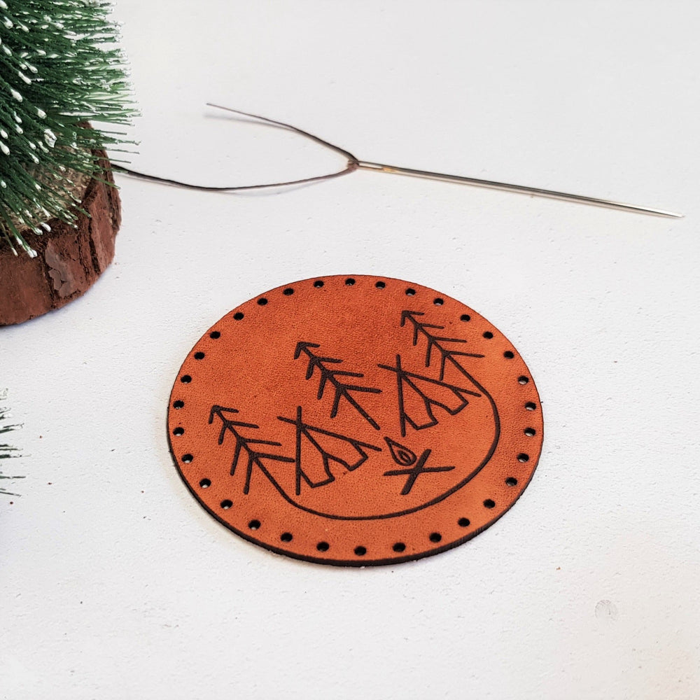 This campfire patch comes with pre-cut stitch holes for ease of stitching.