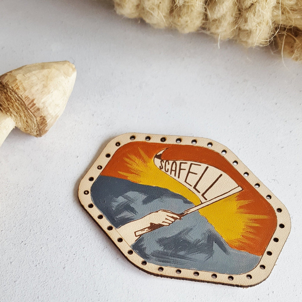 Custom Mountain Conqueror Leather Patch by HORD - The Custom Mountain Conqueror leather patch can be personalised with your favourite mountain name or slogan in the flag! The hiking patch from Hord.