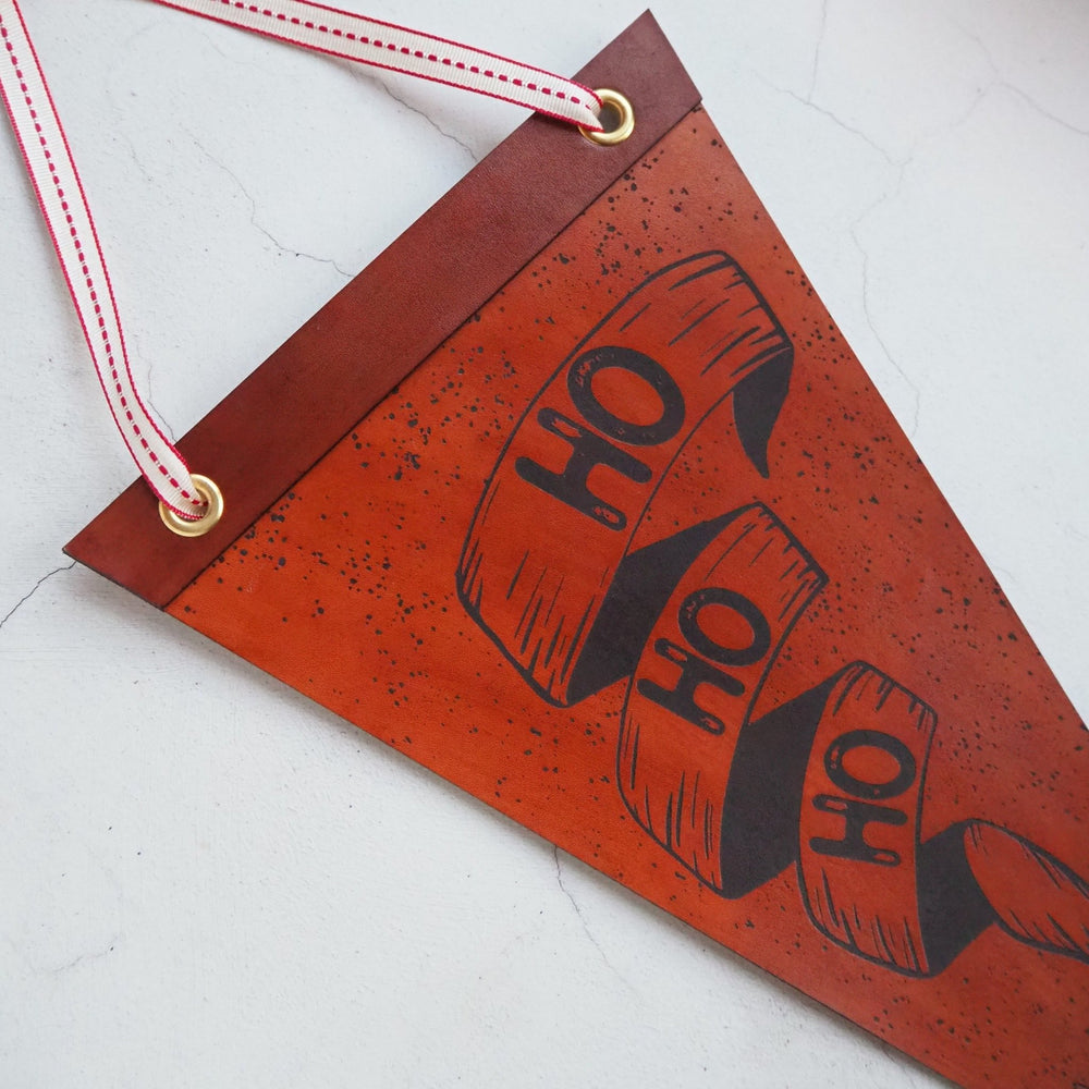 The Ho Ho Ho Banner is the perfect large Christmas banner to bring in the festive cheer to your home. 