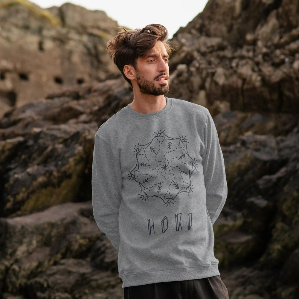 
                  
                    Mountain Mandala Sweater, Unisex in light heather.
                  
                