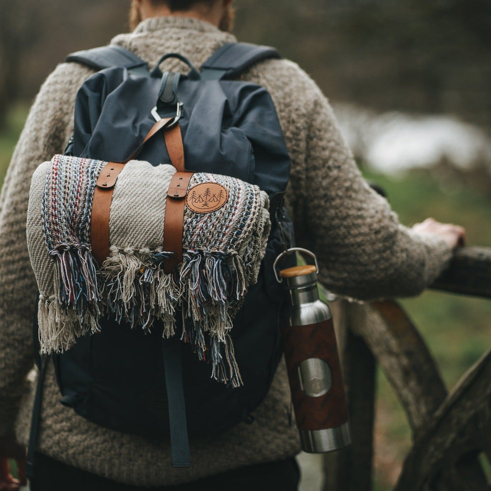 This picnic blanket carry strap has been handcrafted from luxurious leather.