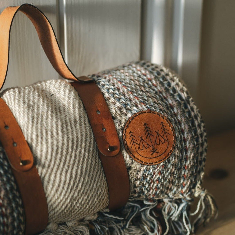 The picnic blanket carry strap from Hord with the camper blanket