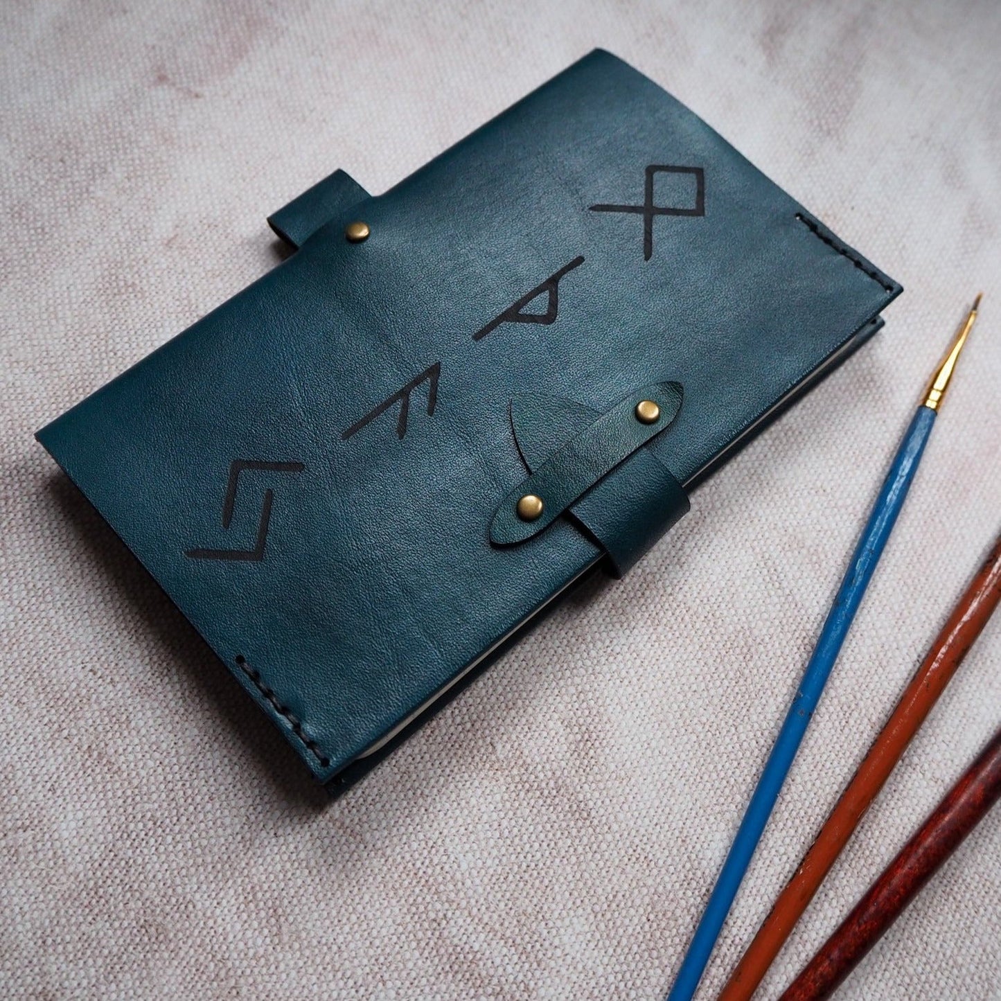 The Viking Rune Leather Pocket Journal, an A6 Notebook Cover By HÔRD. 