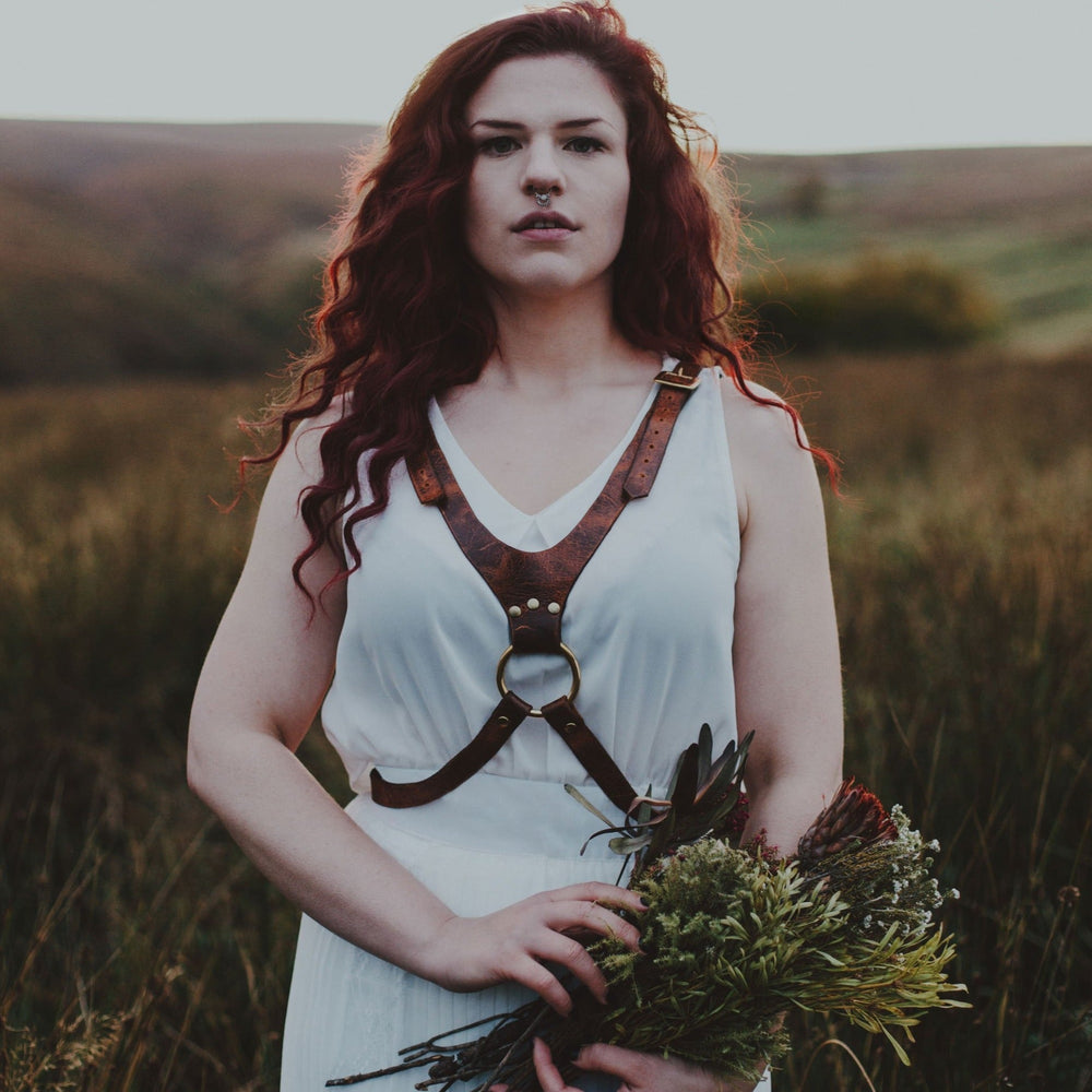 This custom leather harness is inspired by the antlers of an elk, made from solid brass and antique pull up leather. By Hord.
