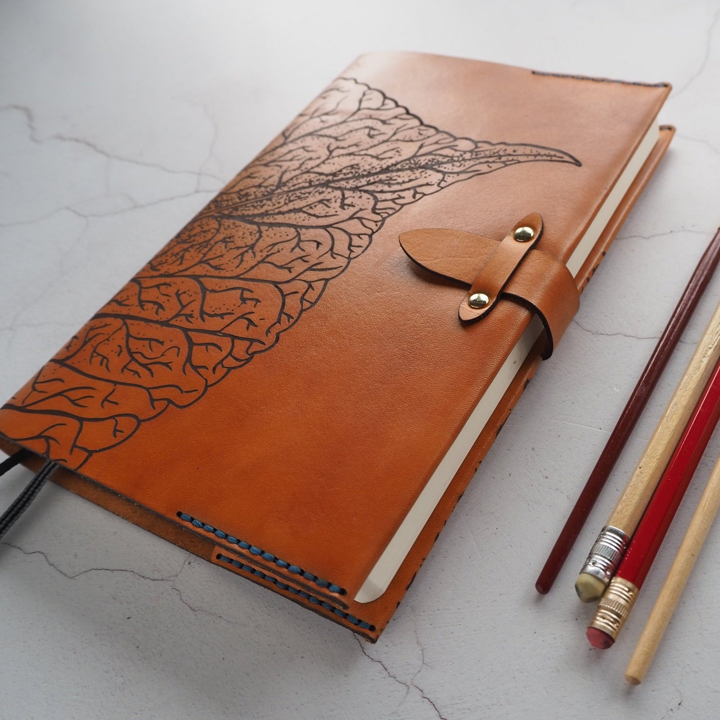 The Mulberry Leaf Journal Cover by HÔRD with clasp tightened.