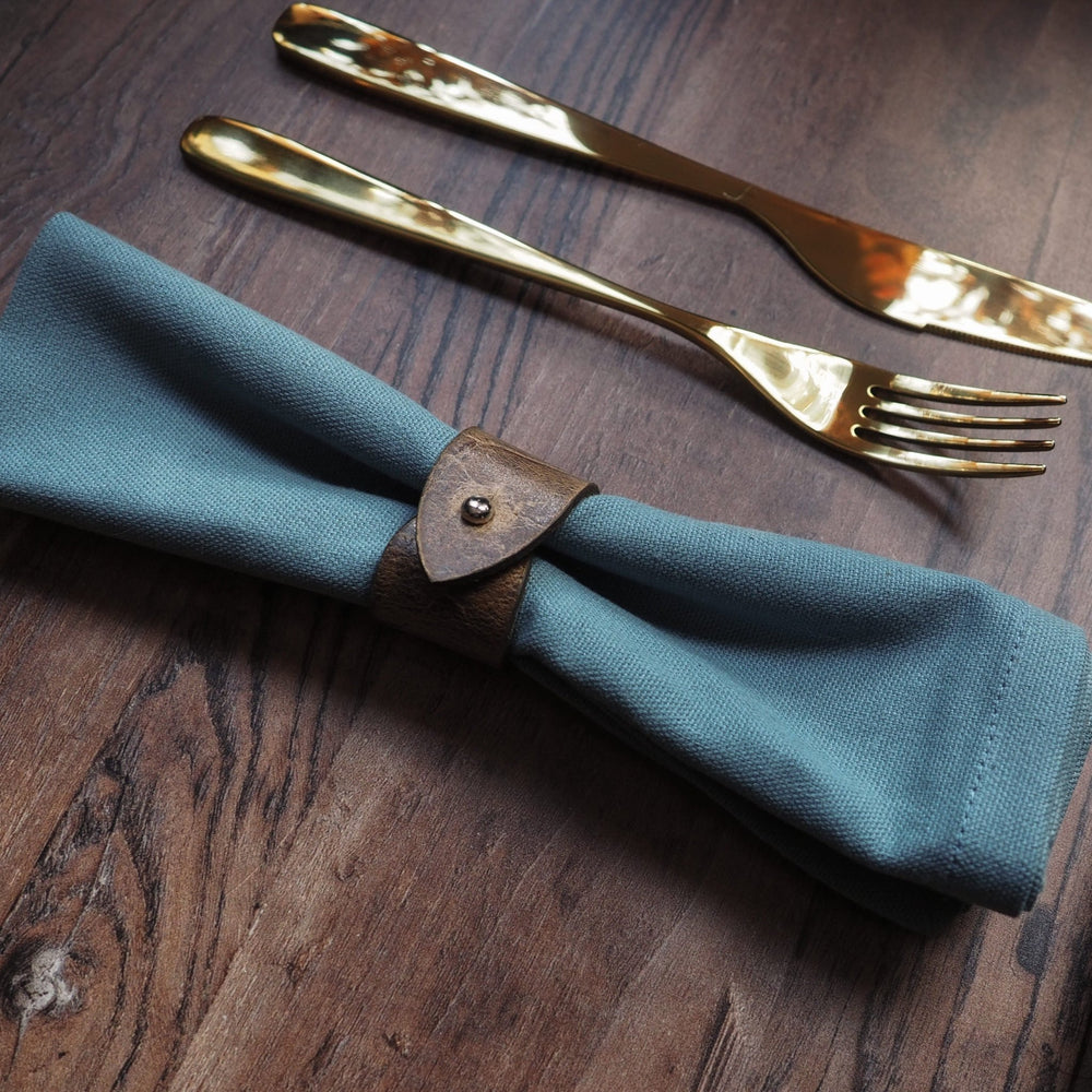 The Oak Napkin Ring, an offering from the leather napkin rings from HÔRD.