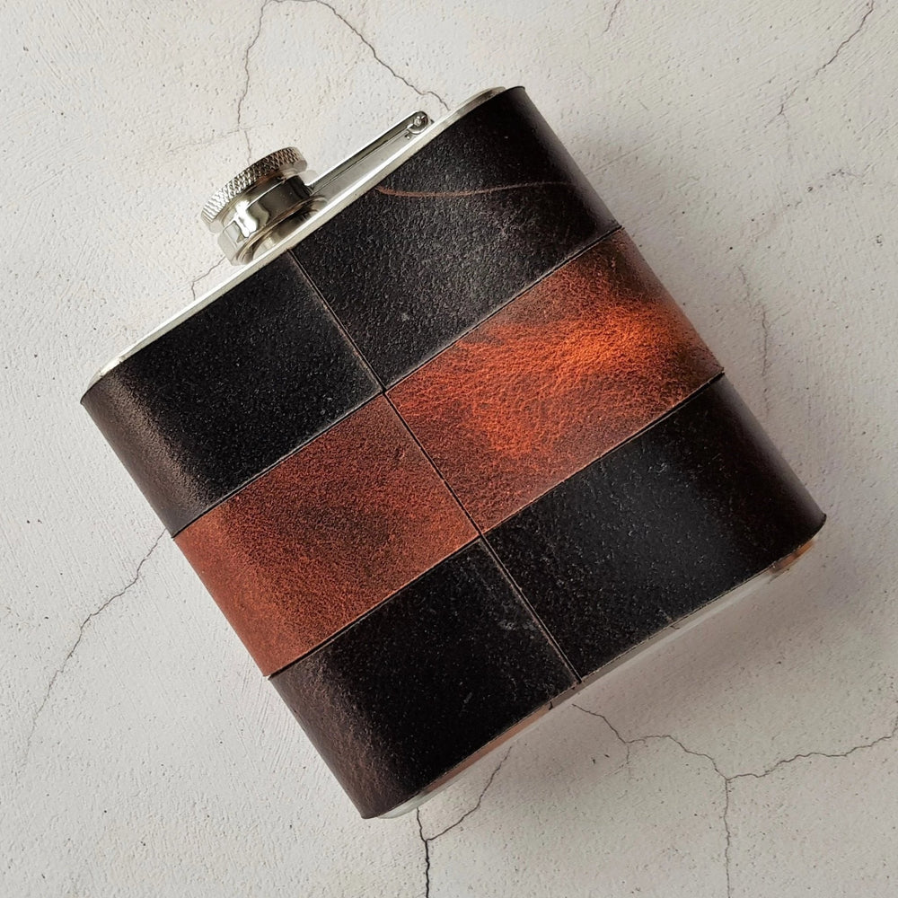 
                  
                    Posterior view of the Peat & Rust Leather Flask.
                  
                