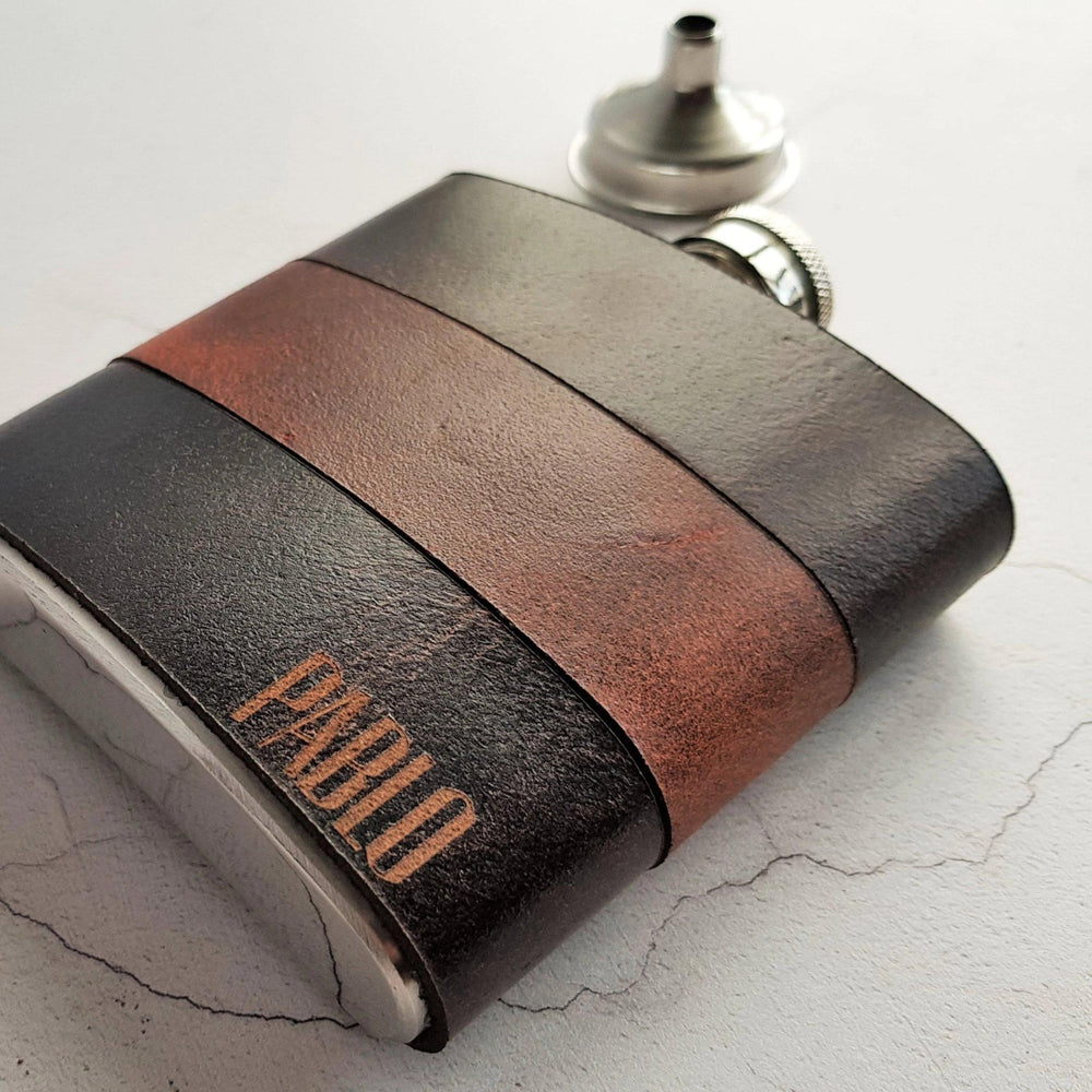 
                  
                    Closer look at the engraving of the designer hip flask from Hôrd.
                  
                