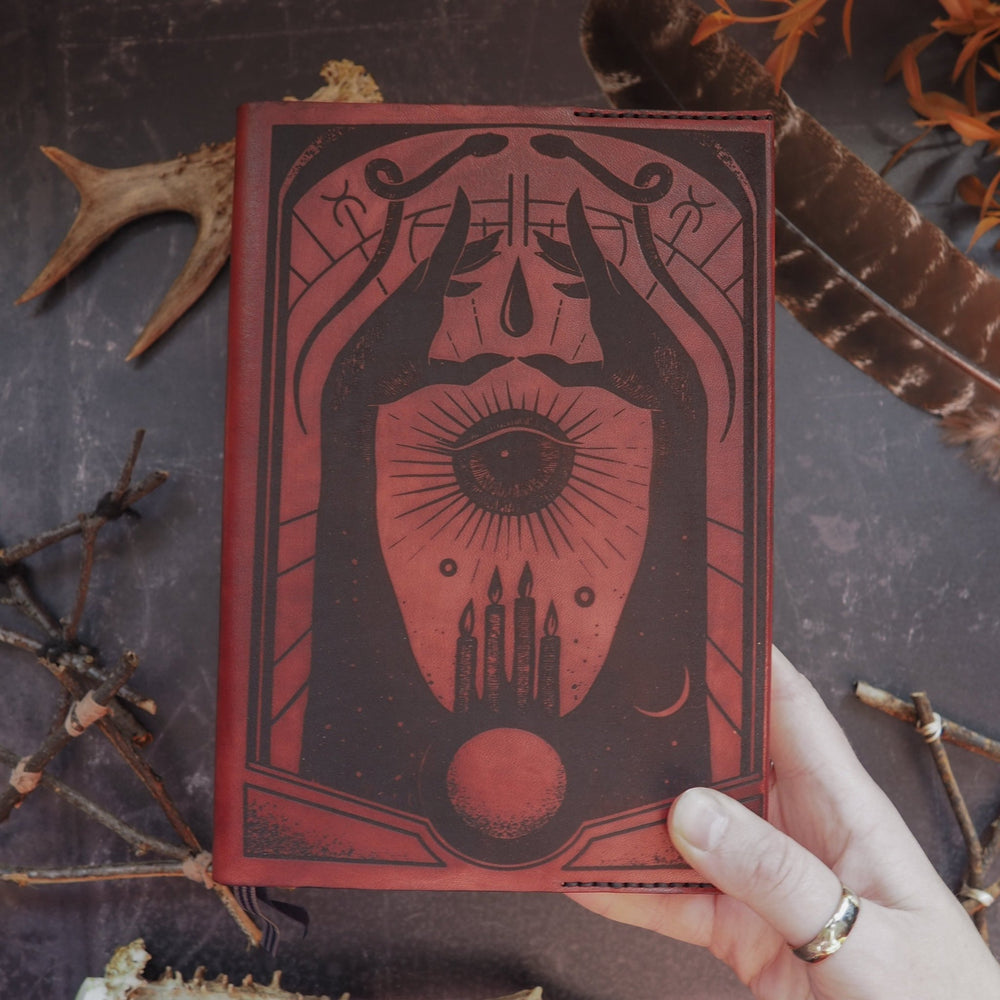 
                  
                    Handcrafted Spell book Leather Journal Cover by HÔRD in bordeaux leather colour. 
                  
                