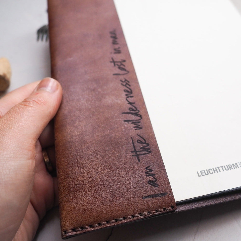 
                  
                    Personalisation example of inner sleeve of the leather journal cover with a custom text.
                  
                