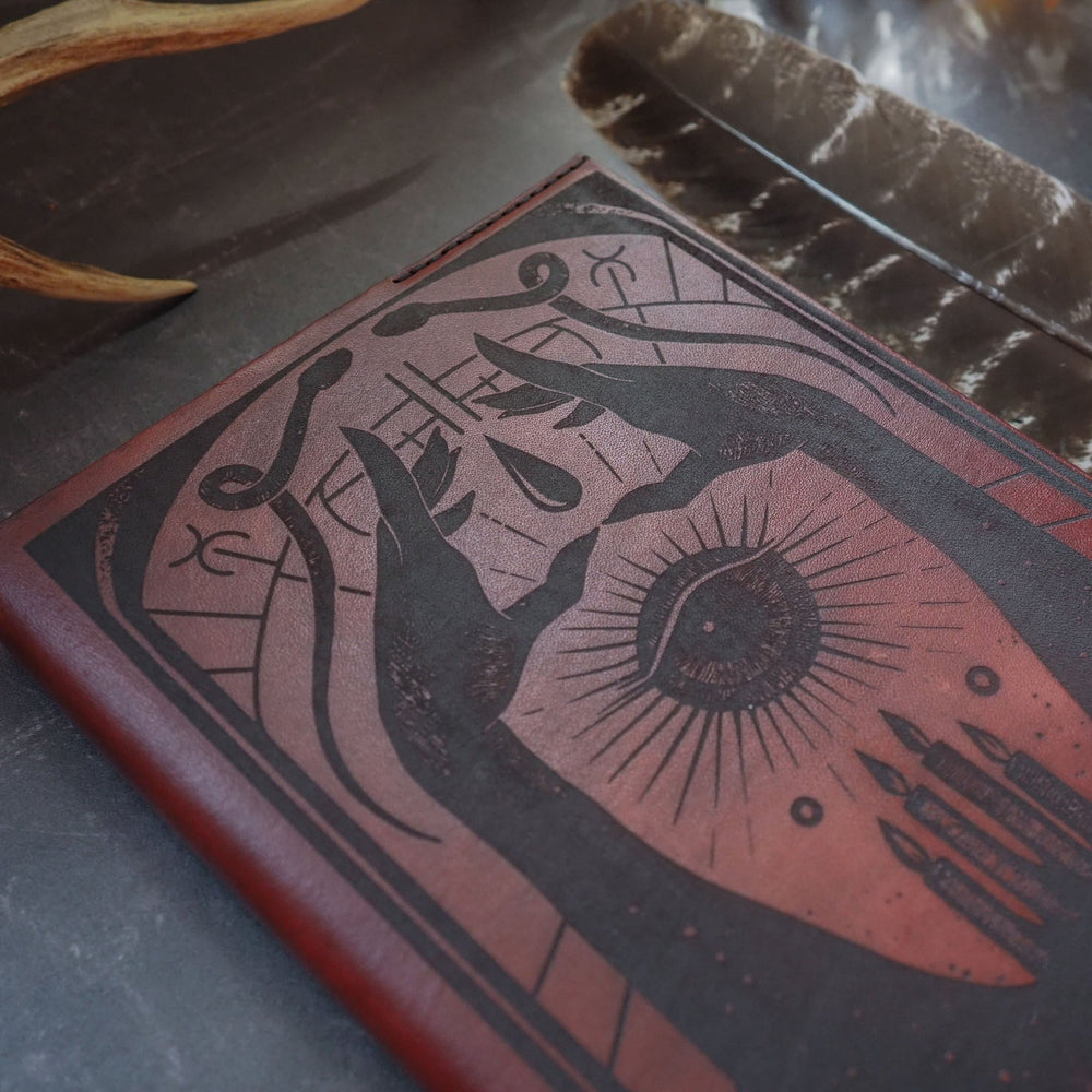 
                  
                    Close up of the Spell book leather journal cover by HÔRD.
                  
                
