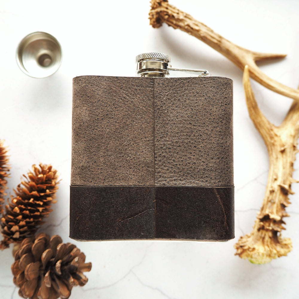 
                  
                    Posterior view of the monogram hip flask.
                  
                